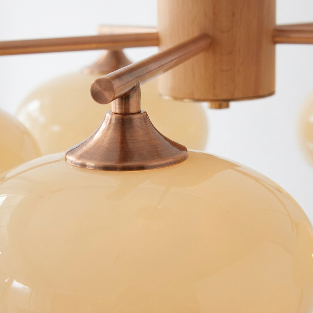 Close-up of a milk-yellow glass shade and copper fitting