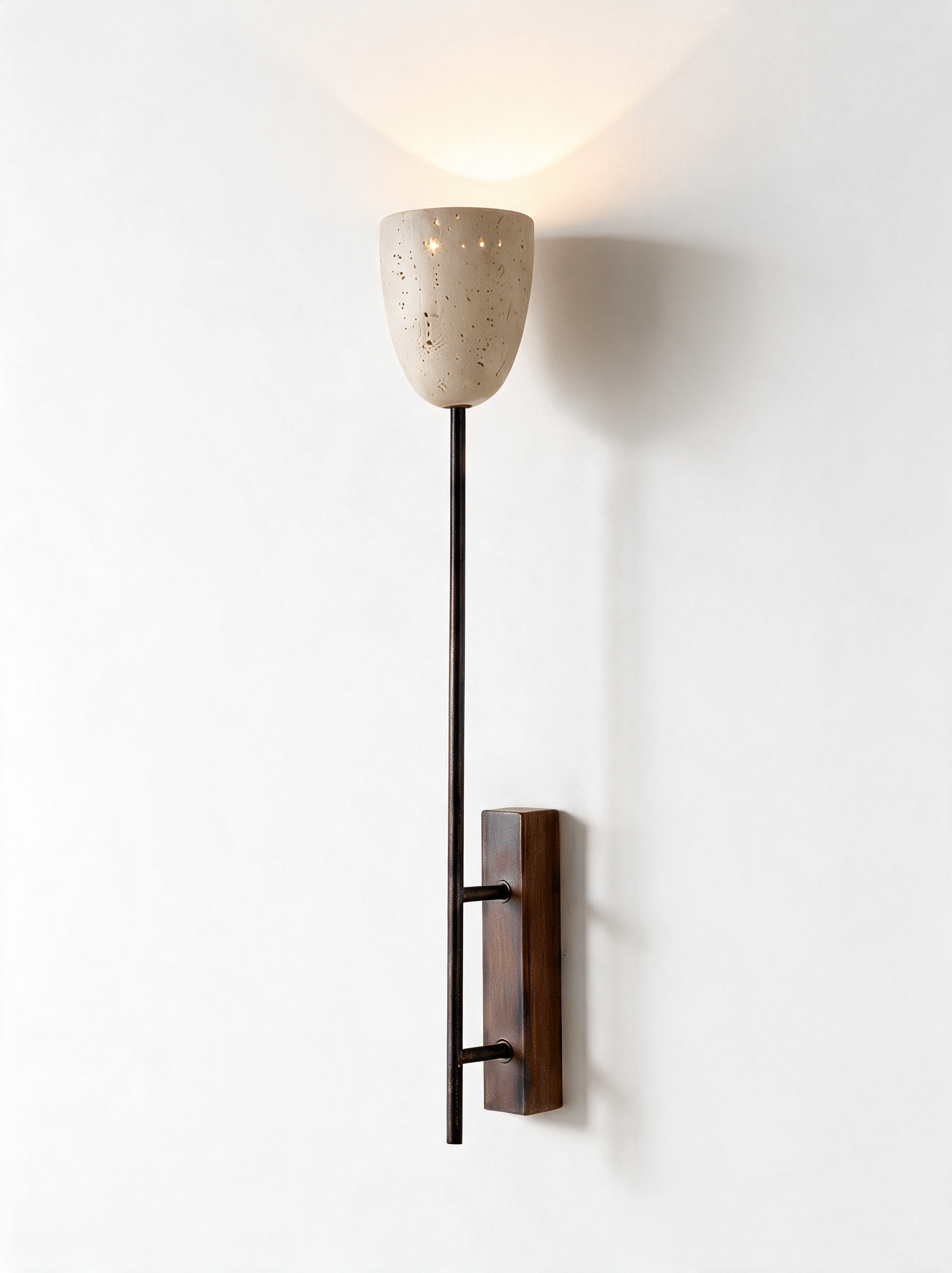 AIR HAVEN Slim Travertine Wall Sconce - three-quarter studio view