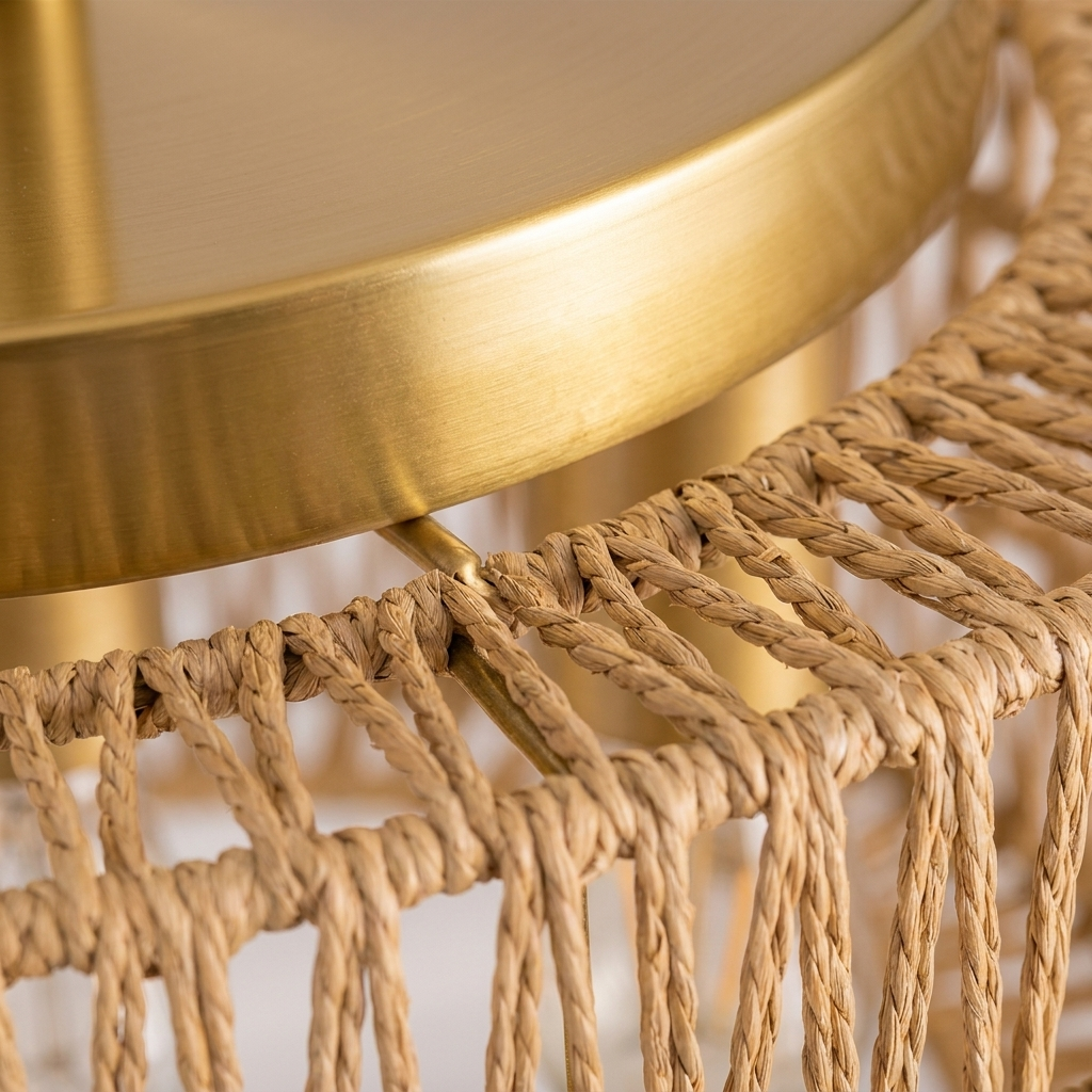 Close-up of the gold trim ring on the rattan ceiling light