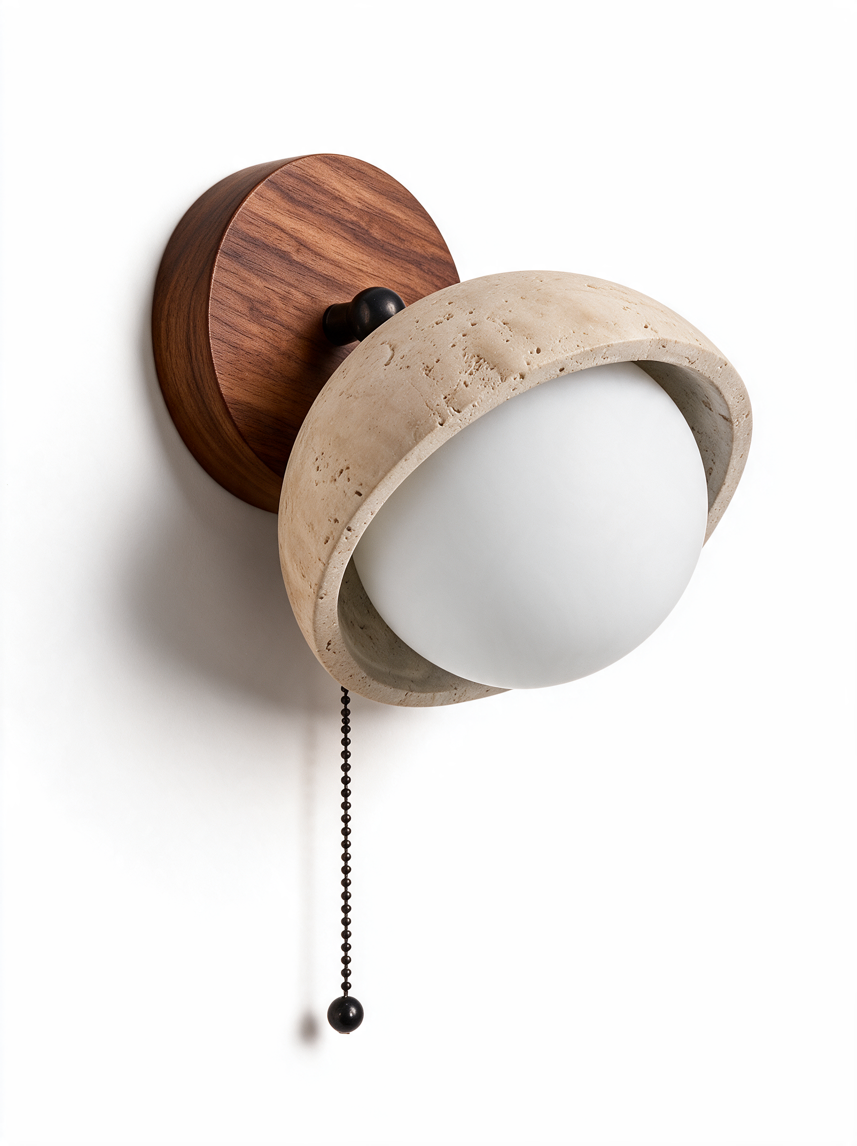 AIR HAVEN Carved Travertine Bedside Sconce - Three-Quarter Studio